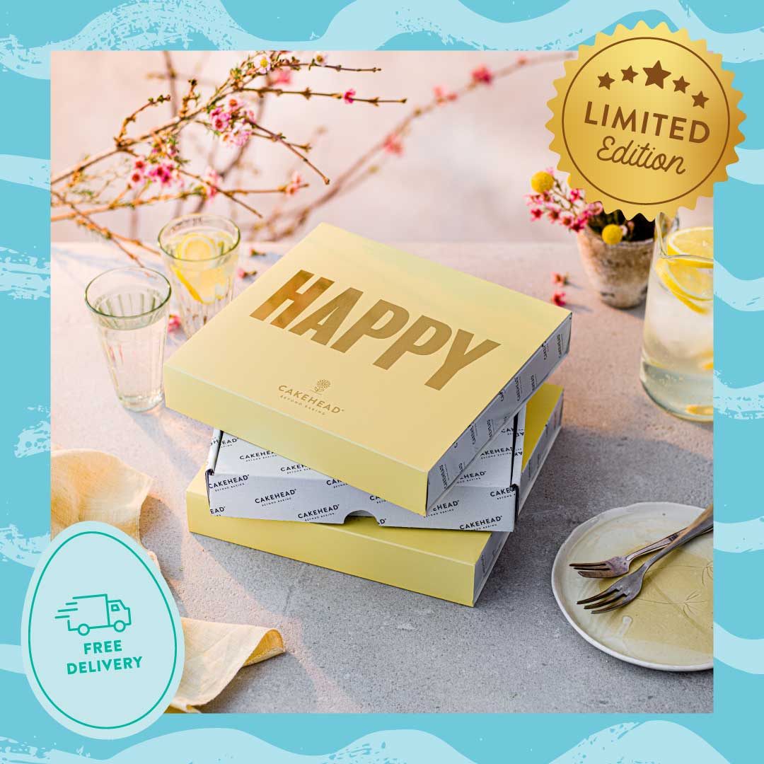 Say 'Happy Easter' with our Happy Box, sure to spread some joy this Spring 🌼🐣  😋Pre order now ready for Easter, including free working day delivery and a personalised gift note 💌 Buy now via cakehead.co.uk