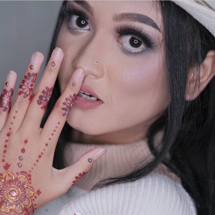 Dewi Yan singer official tweet media