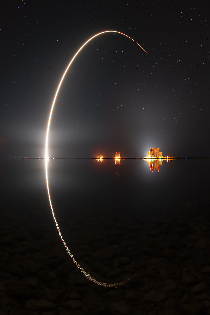 Click for full: Falcon 9 launches Starlink 21 this morning, the third launch from Cape Canaveral in ten days. A shot I've been wanting to get for years. The river is rarely so glassy! LaunchPhotography.com