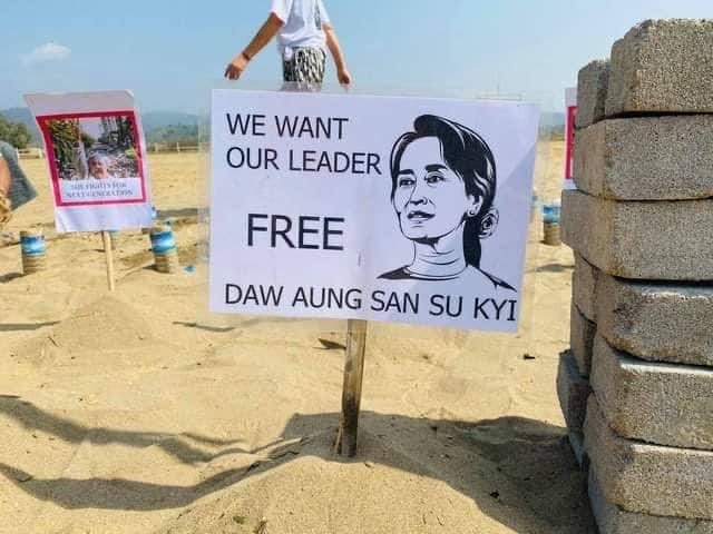 IrrawaddyNews's tweet photo. Protest in jade hub

A protester-free, anti-regime protest was held in Tamakhan village in #Hpakant, #Myanmar’s jade-mining hub, in Kachin State, on Sunday morning. Placards demanded the release of detained leaders and for UN protection. 
(Photo: Kachinwaves) https://t.co/s5xujQ31A5