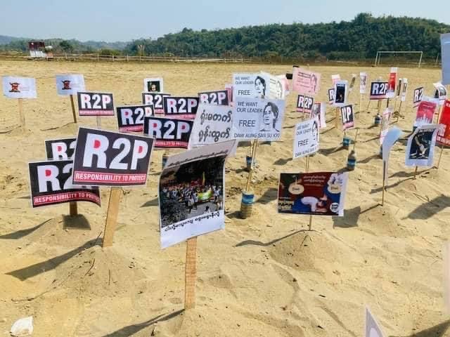 IrrawaddyNews's tweet photo. Protest in jade hub

A protester-free, anti-regime protest was held in Tamakhan village in #Hpakant, #Myanmar’s jade-mining hub, in Kachin State, on Sunday morning. Placards demanded the release of detained leaders and for UN protection. 
(Photo: Kachinwaves) https://t.co/s5xujQ31A5