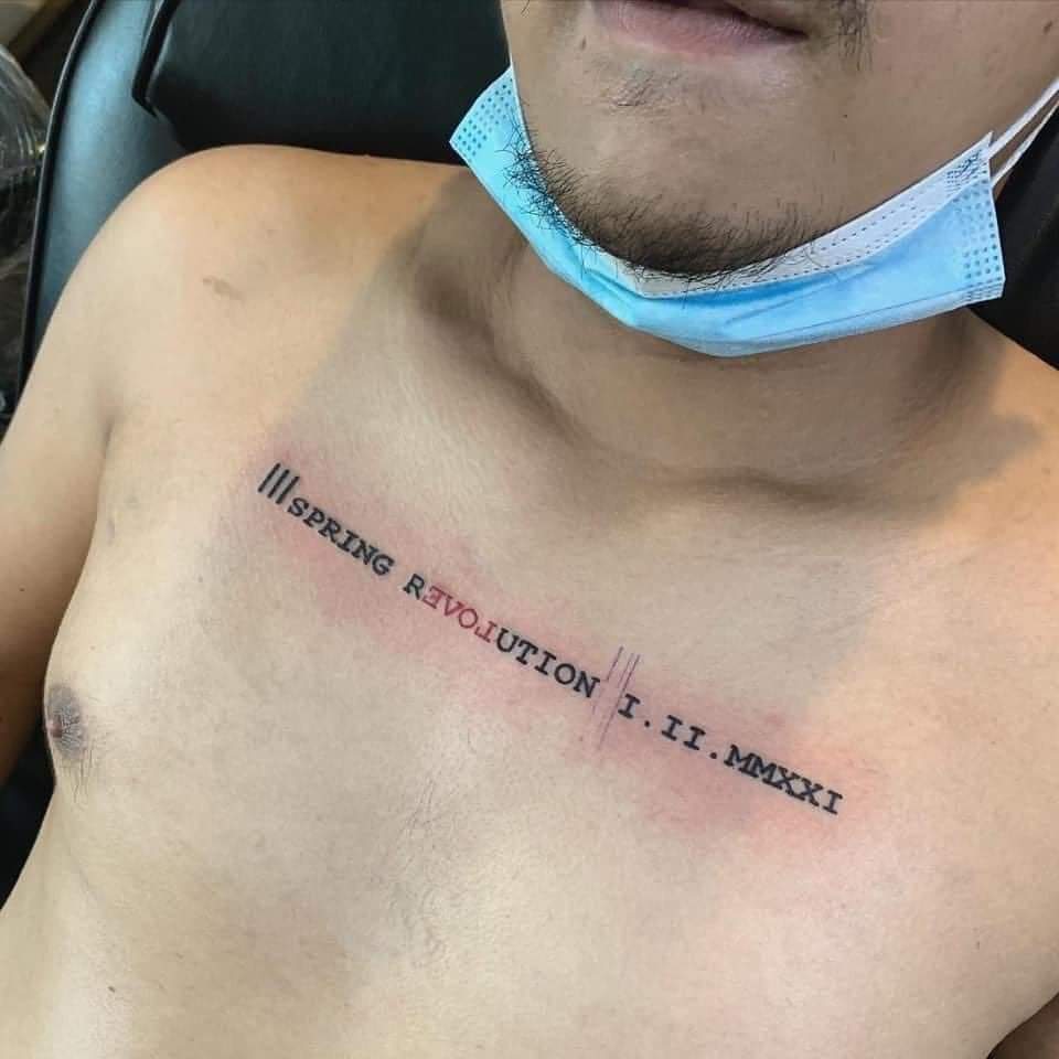 Asl1485's tweet photo. The man got tattoo “Spring Revolution” and he just fallen tonight in Hlaing, Yangon.

#WhatsHappeningInMyanmar  #Mar14Coup https://t.co/IGUSHtBAhi