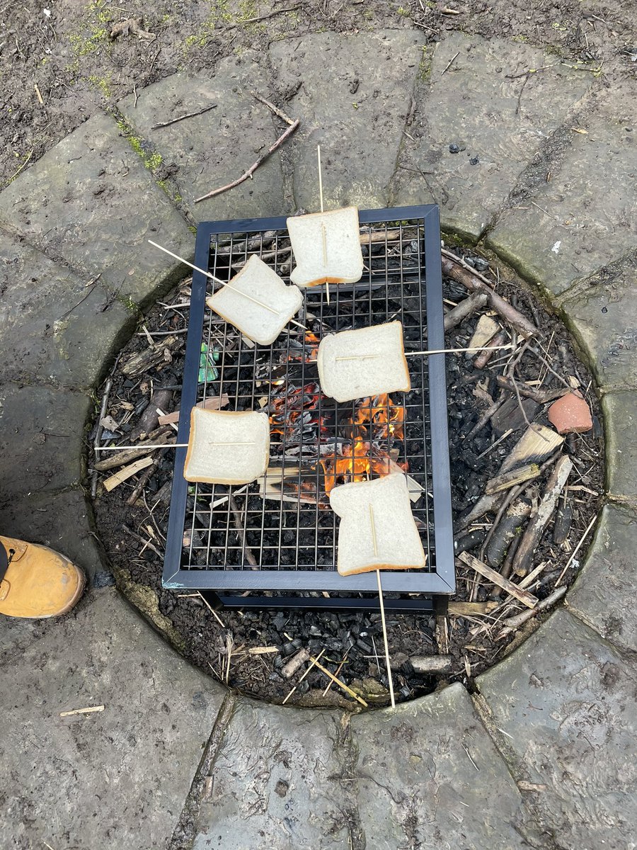 MrswhiteY6's tweet photo. Our first Forest School session was a big hit! We learned how to enter and exit the fire pit safely and even toasted bread on the fire🔥 What will we do next week?  @AlthorpeKeadby #forestschool #toastonthefire #firerules https://t.co/QgT01QO53A