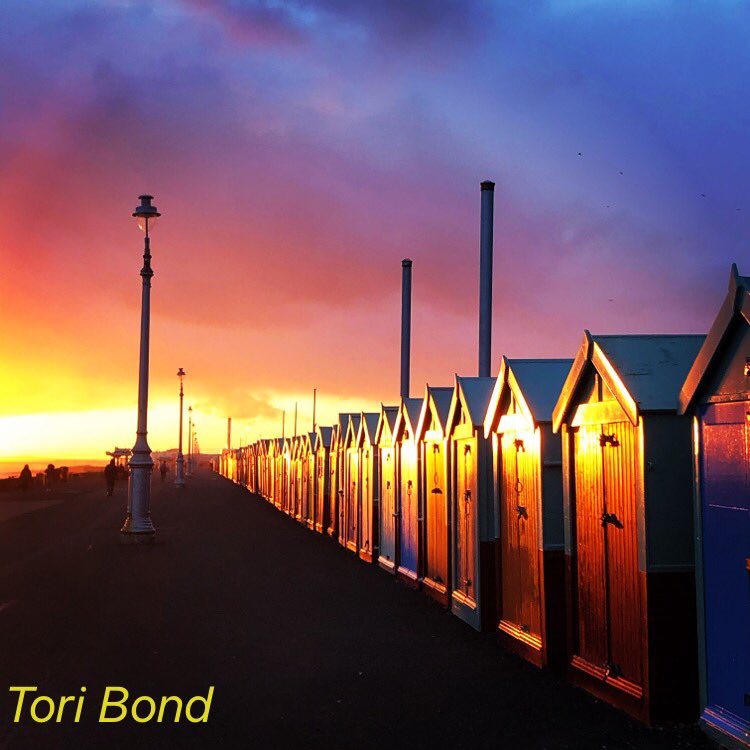 Hove beach huts in a tropical sky ...#beach #sunset #sky #Brighton #photography #colours