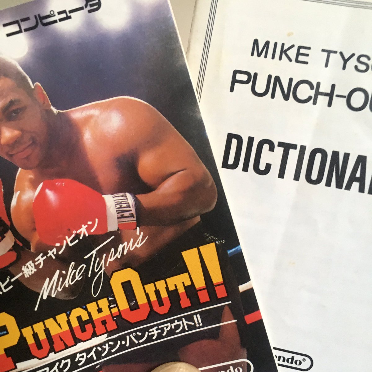 DotDecorANDmore's tweet photo. Did you know the Famicom version of Mike Tyson’s Punch-Out!! comes with a dictionary?  What’s inside, you ask?  Visit my YouTube page: dotdecorANDmore (link in profile) to find out! https://t.co/OOizg58F15