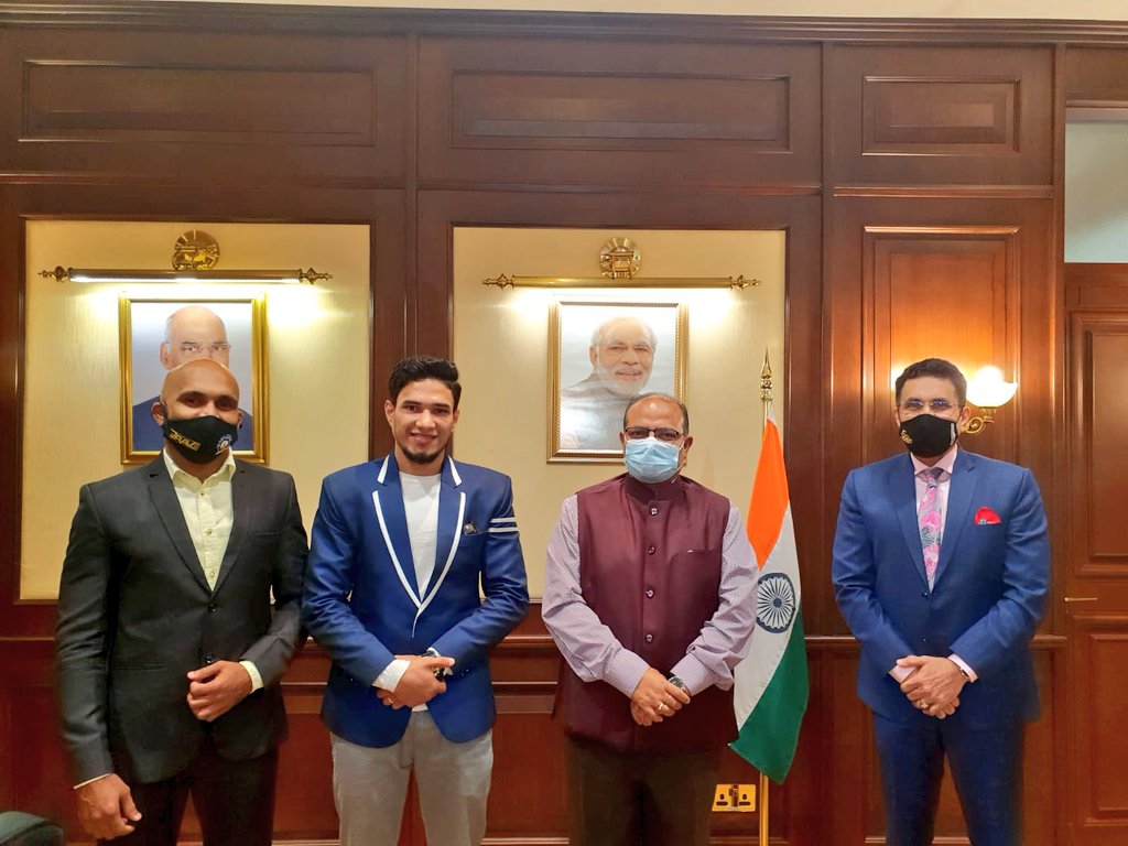 IndiaInBahrain's tweet photo. Ambassador Piyush Srivastava met Indian MMA fighter Mohammed Farhad @farhadMMA &amp; congratulated him on his fabulous KO win against the Pakistani opponent at #BRAVECF47 Asian Domination held in Bahrain. https://t.co/3icA0OuC3l