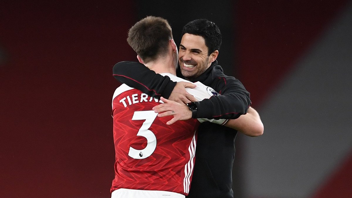 Mikel Arteta hugs Kieran Tierney at full-time