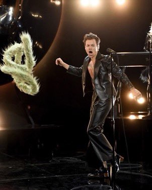 nobarafiles's tweet photo. harry styles breaking gender roles once again at the 2021 grammys https://t.co/e65WB7stDb