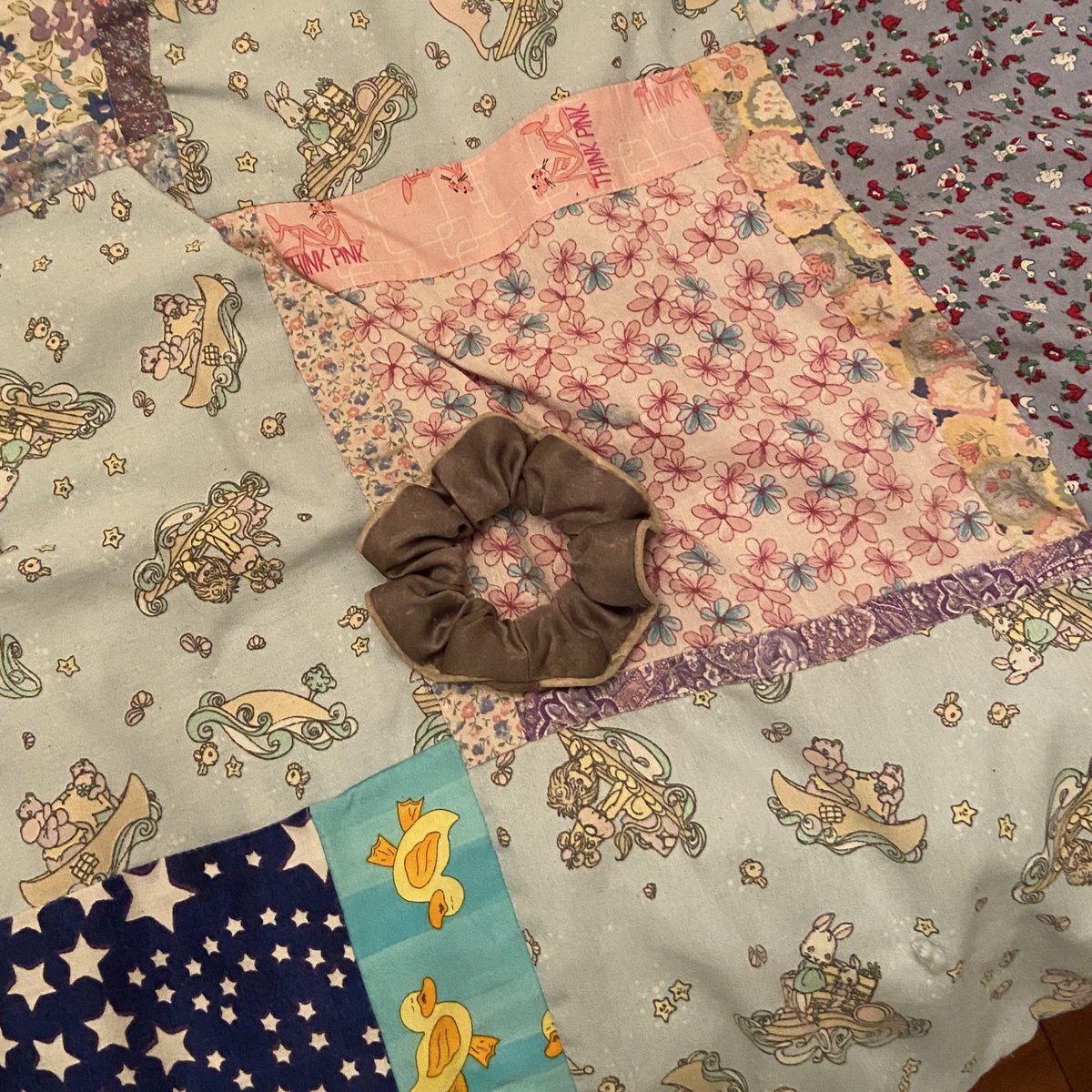 __youngbella__'s tweet photo. I’m gonna do a thread of the stuff Nolan leaves on my bed when I leave. 

🪳 I introduce the scrunchie and the kong frisbee https://t.co/y9BzTFM7Vw