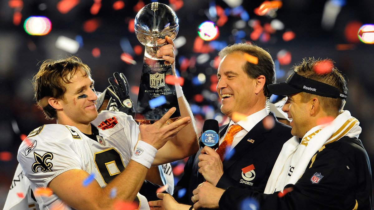 Saints's tweet photo. Photos throughout @DrewBrees' legendary career ⚜️

📸: https://t.co/U5LOus12dg

#ThankYouDrew https://t.co/4xDyFgOK0L