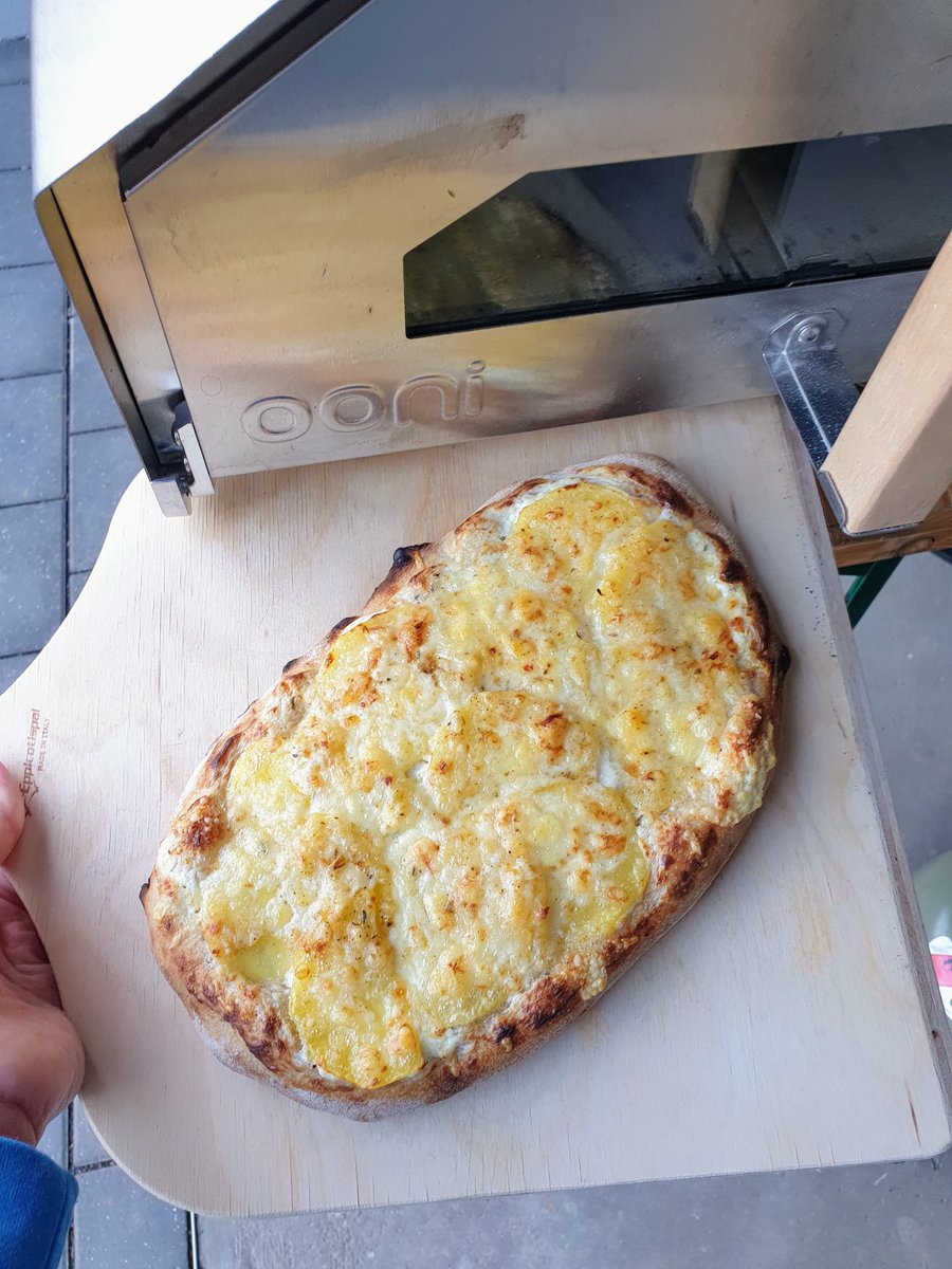 OlumUndDoener's tweet photo. No pizza today. This one ist called Dinnele or Dinnete. It is a sourdough with 20% rye and topped with sliced potatos and Bergkäse. Made in my @OoniHQ https://t.co/aVV6eCU2q8