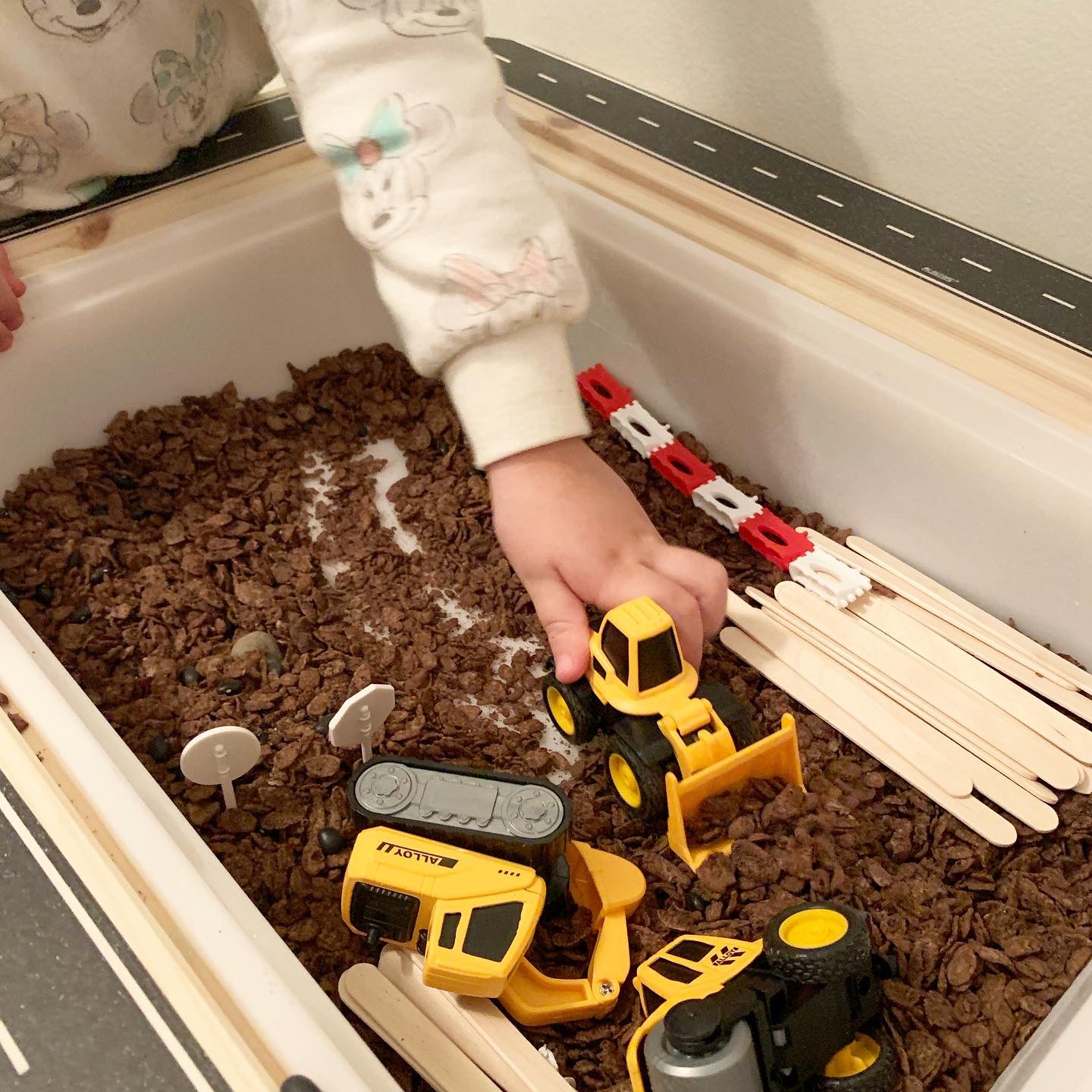 Construction Truck Sensory Bin - MamaMeganAllysa