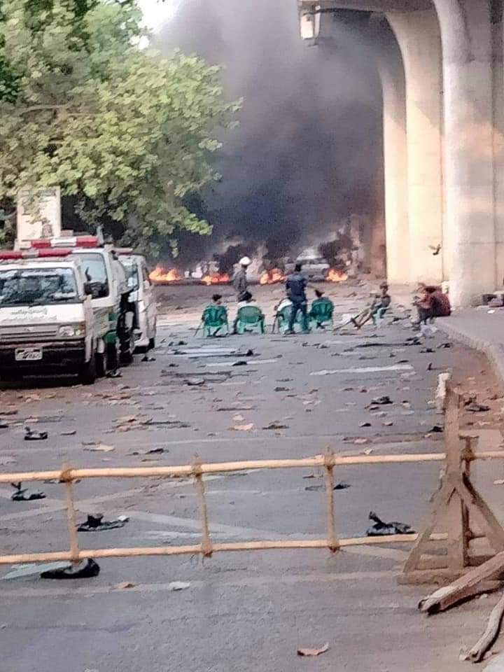 ChitThae97's tweet photo. At 8:30 am, ThaMine was on the ground. Myanmar's coup insurgents were oppressing the people like a battlefield.
#WhatsHappeningInMyanmar 
#RejectMilitaryCoup 
#democracy 
#SaveMyammar https://t.co/Q9Rn9H6Az8