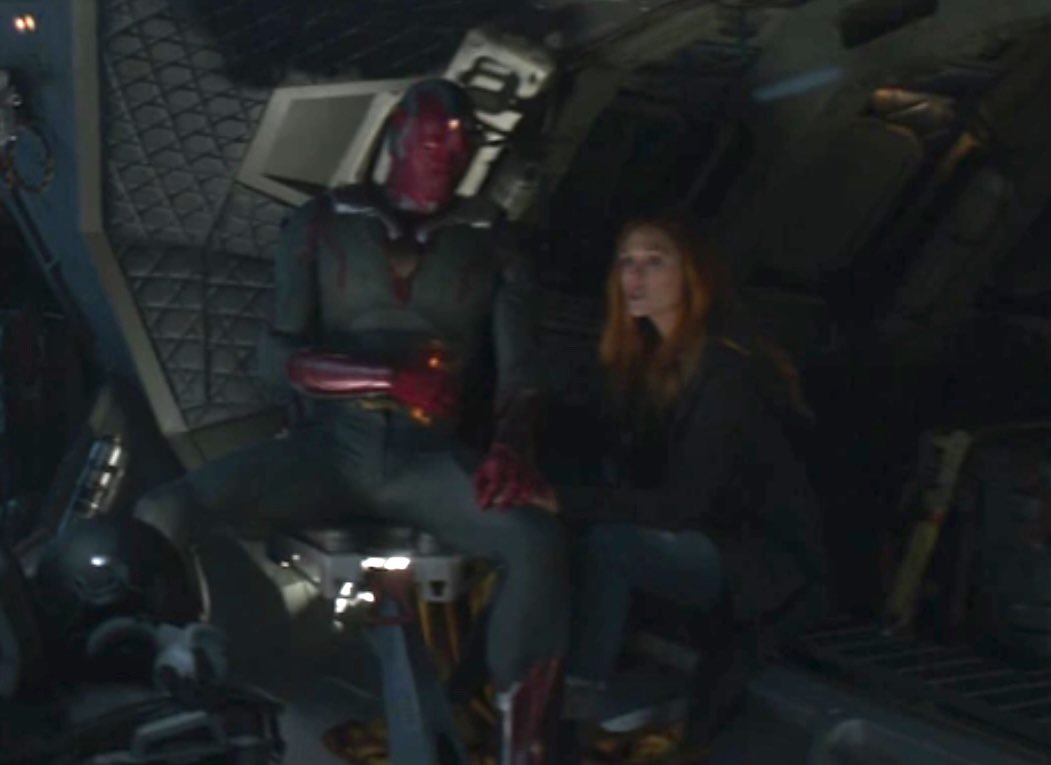 witchywandas's tweet photo. obsessed with Wanda and Vision holding onto each other in the background moments of Infinity War https://t.co/8O30y4HISb
