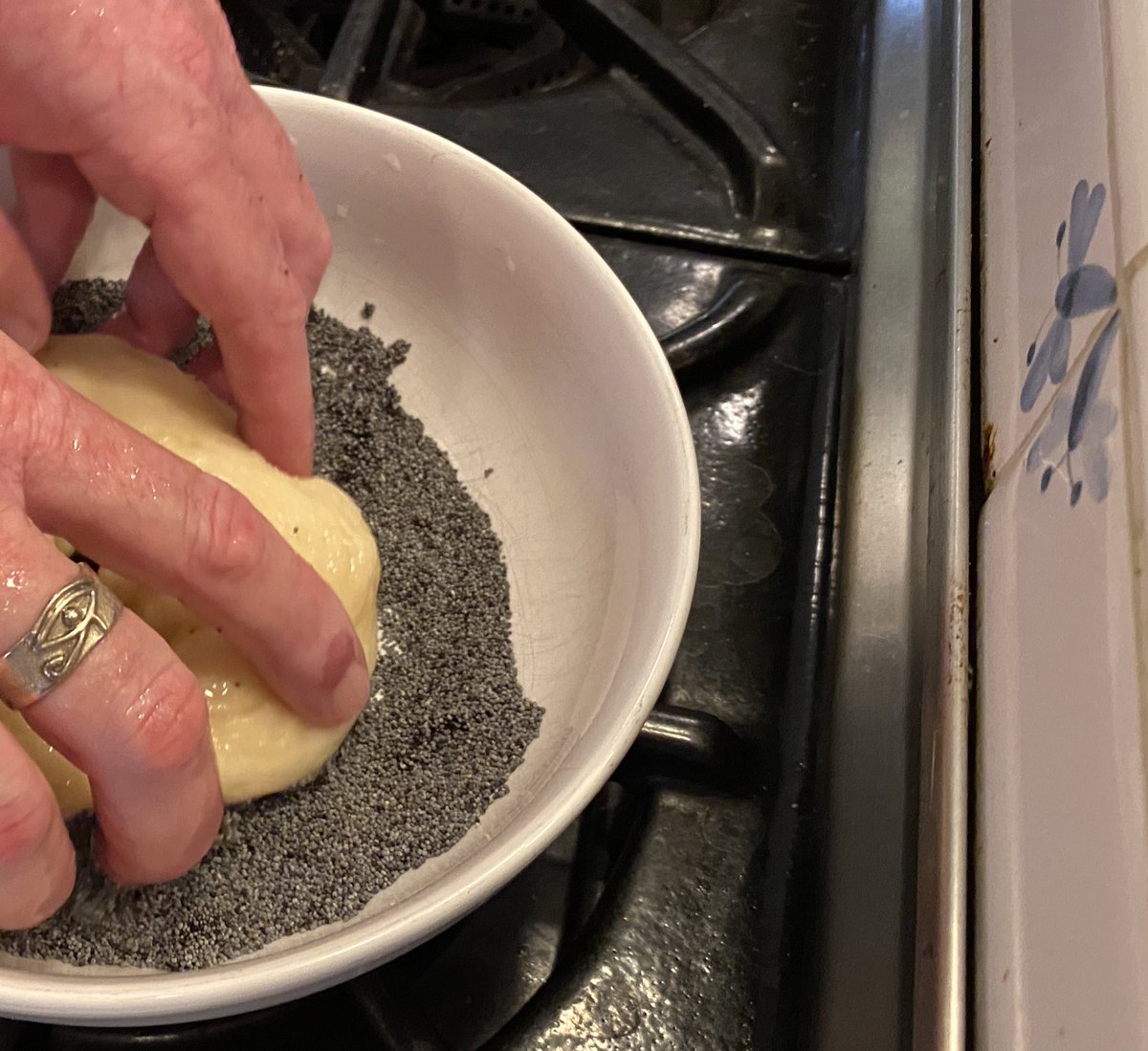 The stoic in me forces me to prove I can bake a plain bagel before authorizing me to put toppings on. I feel like we passed. Toppings are easy- fill a bowl with poppy seeds, sesame seeds, etc. Dip the bagel in them after the cooking bath and place TOPPING DOWN on the boards.