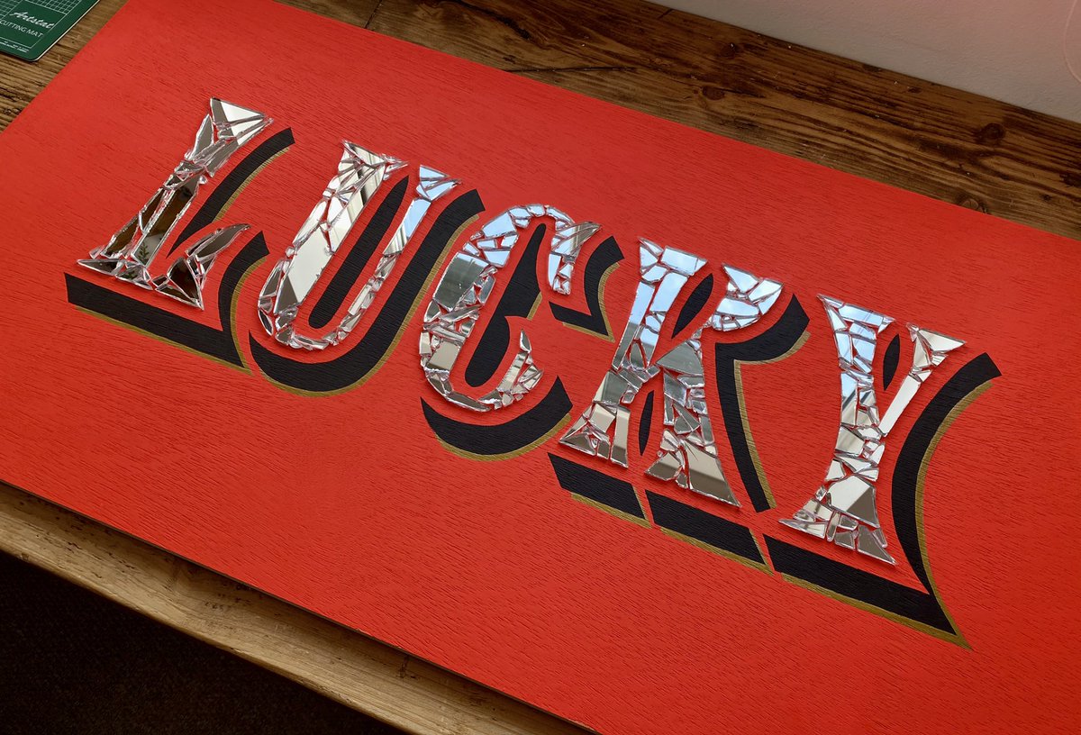 So...I accidentally broke a mirror 😅 but flipped the bad luck on its head and made some typographic art. Wooden backdrop sprayed fluro hot red with hand drawn drop shadows and glass letterforms. Dm if you’d like to buy, it’s abit rough and ready 😉