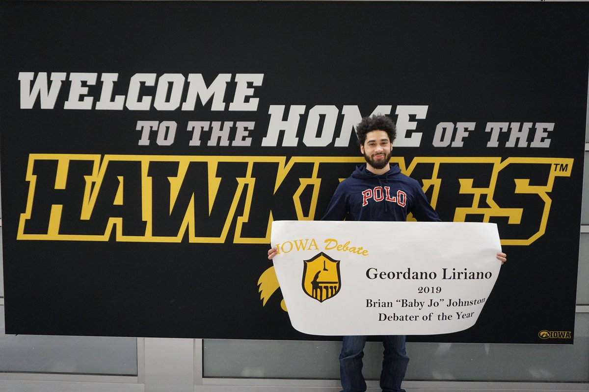 paul_bellus's tweet photo. Day 14: Giving to Iowa Debate. Geo returning to campus as the Intercollegiate Debater of the Year. Iowa Debate Home of Champions. Debate relies on your generosity to create student engagement &amp; learning opportunities. Donate at https://t.co/s79pVNCJuZ.  #1DayForIowa  #IowaDebate https://t.co/b4WUKxC6ZI