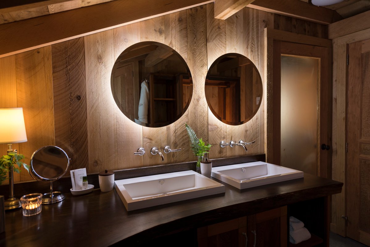 Rugged wilderness doesn't mean a compromise on comfort. Waterfront and Rainforest Deluxe tents feature ensuite bathrooms with heated floors, double sinks and a private outdoor cedar shower opening to bare all views of the surrounding old-growth forest.