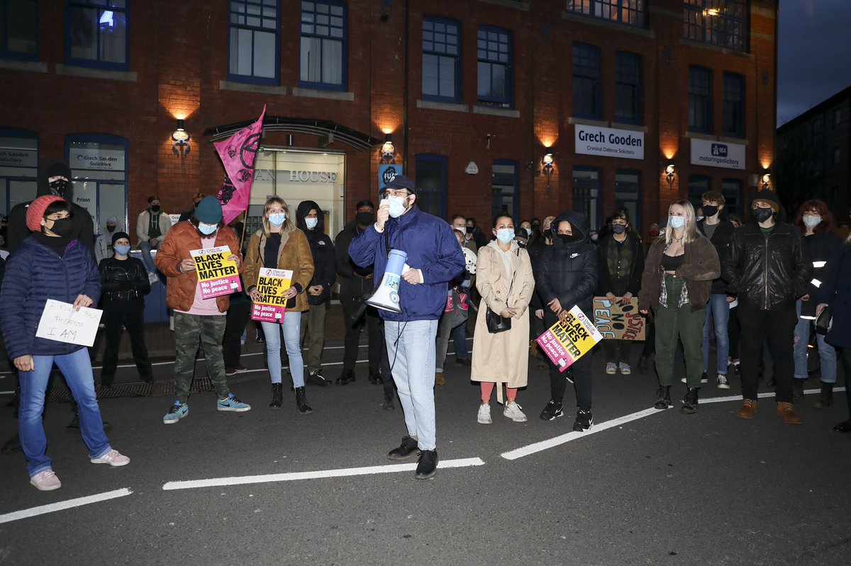 Hashim_PJ's tweet photo. CARDIFF, WALES. MARCH 15 2021. Reclaim these streets protesters gathered outside Cardiff bay police station protesting against police brutality, violence against and women and freedom to protest following the kidnap and murder of Sarah Everard. #reclaimthesestreetscardiff https://t.co/YynvK8Xi5o