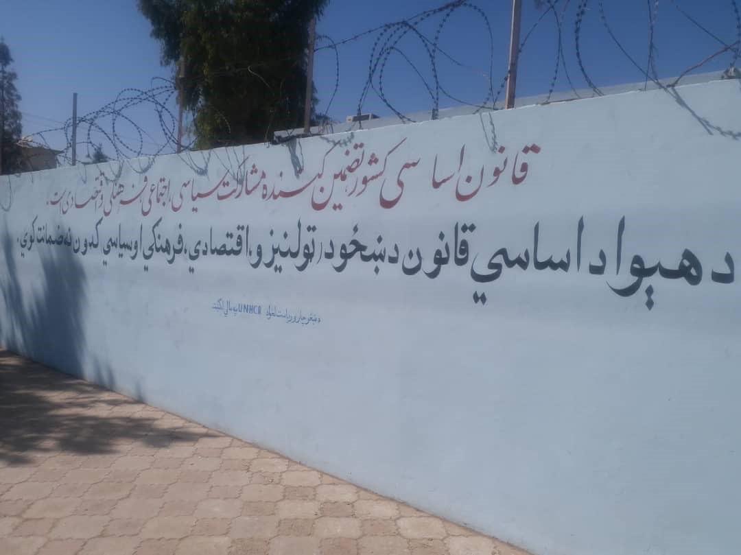 UNHCRAfg's tweet photo. Banners and slogans on the walls in the city in # Helmand province highlights that #Women in #Afghanistan wants #Peace, #DignifiedLife, #WomenRights to be #respected and to play a role in #CountryDevelopment. #WomenParticipation #WomenEmpowerment #GenderEquality #WomenforPeace https://t.co/FgBswonBiQ