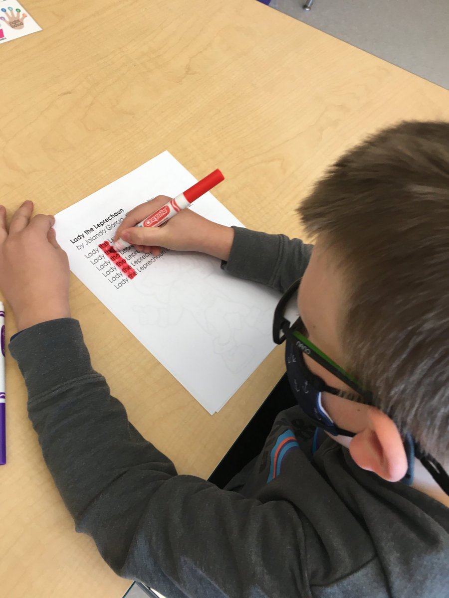 VO Kindergartners finding “snap words” in a poem.