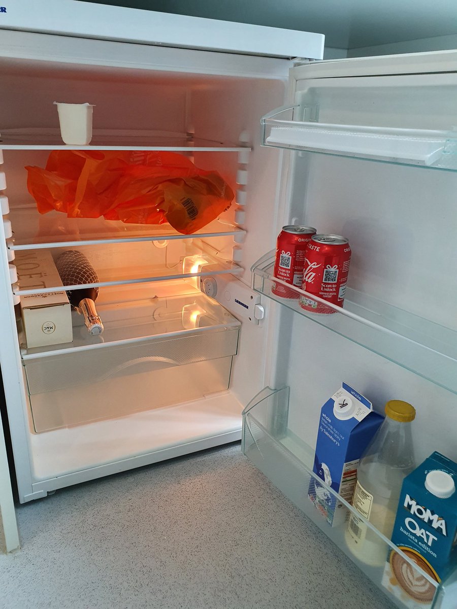Dabrica's tweet photo. A typical lab kitchen fridge:
- expired dairy - check
- coke for late night shifts - check
- unidentified bag with lunch from Sep2020 - check
- Moët&amp;Chandon champagne with floral notes - check https://t.co/R0aPClzR5G