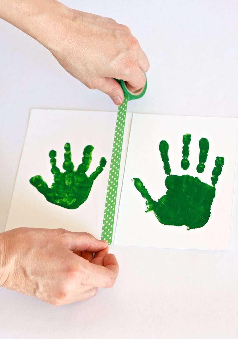 This “leprechaun handprints” project is one of my favorite kids crafts ever. I love pulling mine out each year to put on the mantle. #kidscrafts #funmom #stpatricksday #familyfun