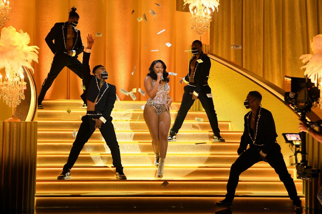 SDEntertainer's tweet photo. Megan Thee Stallion's monumental night at the Grammys ended with her taking home some of the biggest prizes for a new artist, including taking home the awards for Best New Artist.

https://t.co/w4lmQZGiyu https://t.co/FWE4E9YN6t