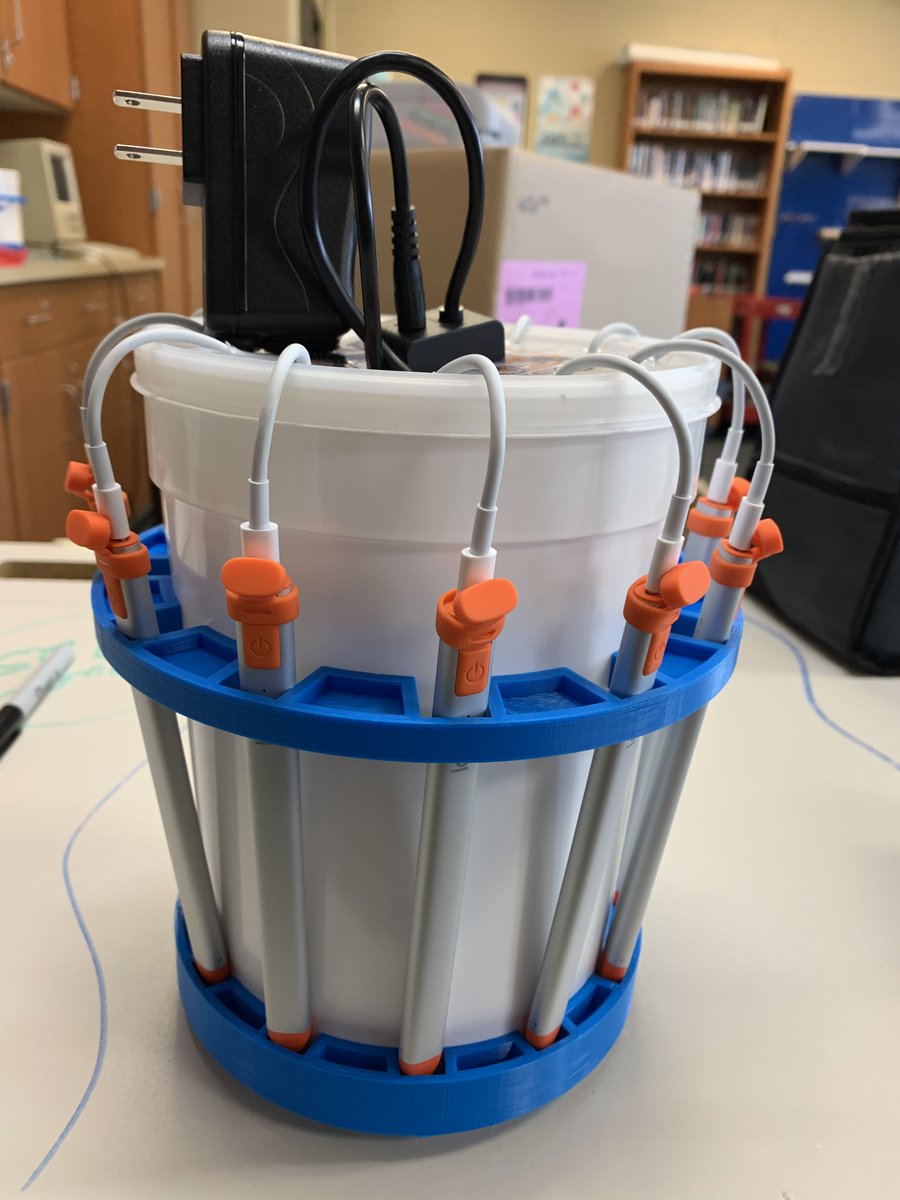 ChrisBarnabei's tweet photo. Welcome Everyone! Chris from Gettysburg, PA. My students just designed a charger/holder for our Logitech Crayons using repurposed ice cream buckets and some 3D printing. It felt like it took over 100 iterations! 
#AppleEDUchat
#designthinking https://t.co/CaUtdWpRv5