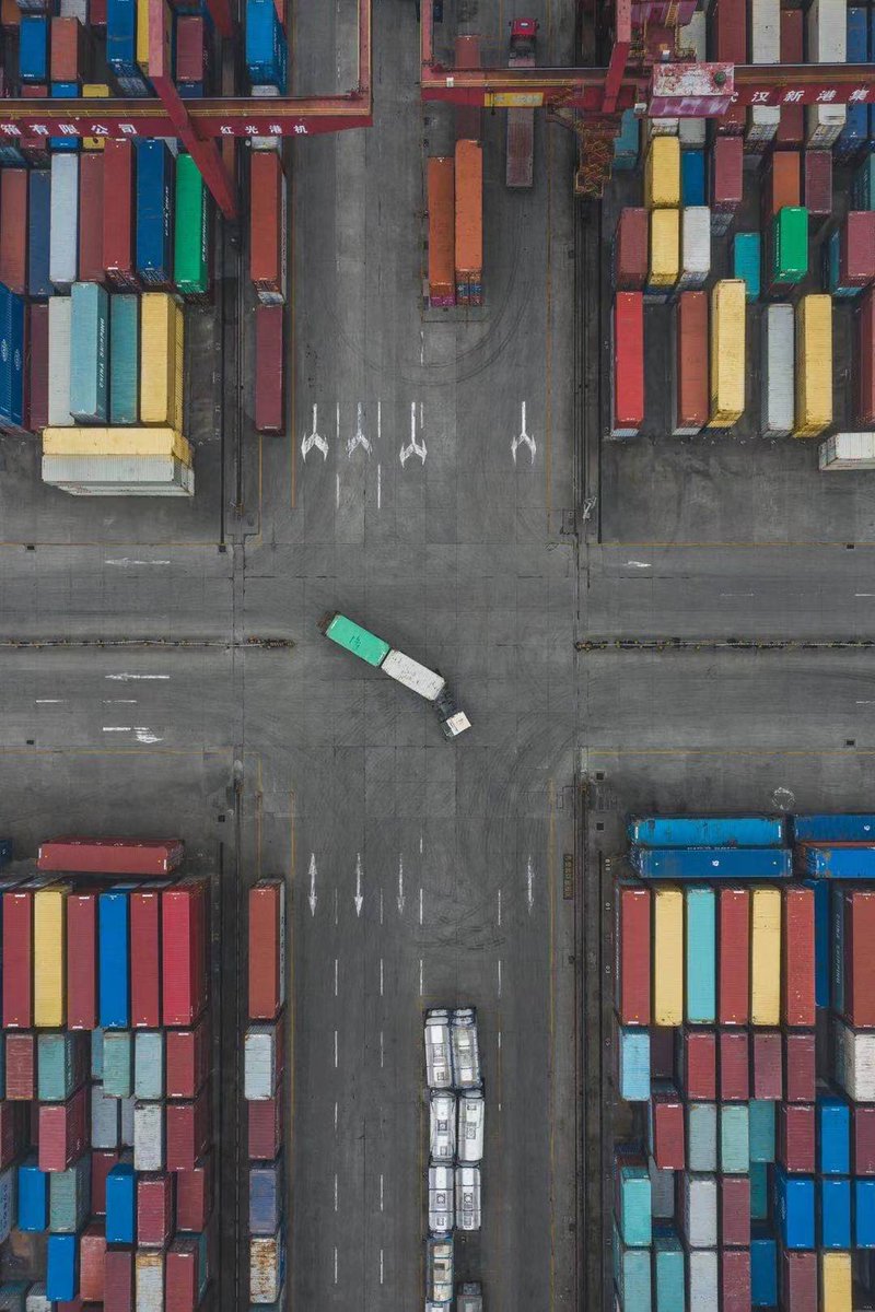 visit_wuhan's tweet photo. After the spring, the New Port of Wuhan became extremely busy again. The colourful containers are exactly the colour of spring. The slowly driving trucks, loaded with hope, headed for the spring of Wuhan. (Photo by @ins: pominger)
#hancity #springinwuhan #wuhanvitality https://t.co/AFTo1O9tDS