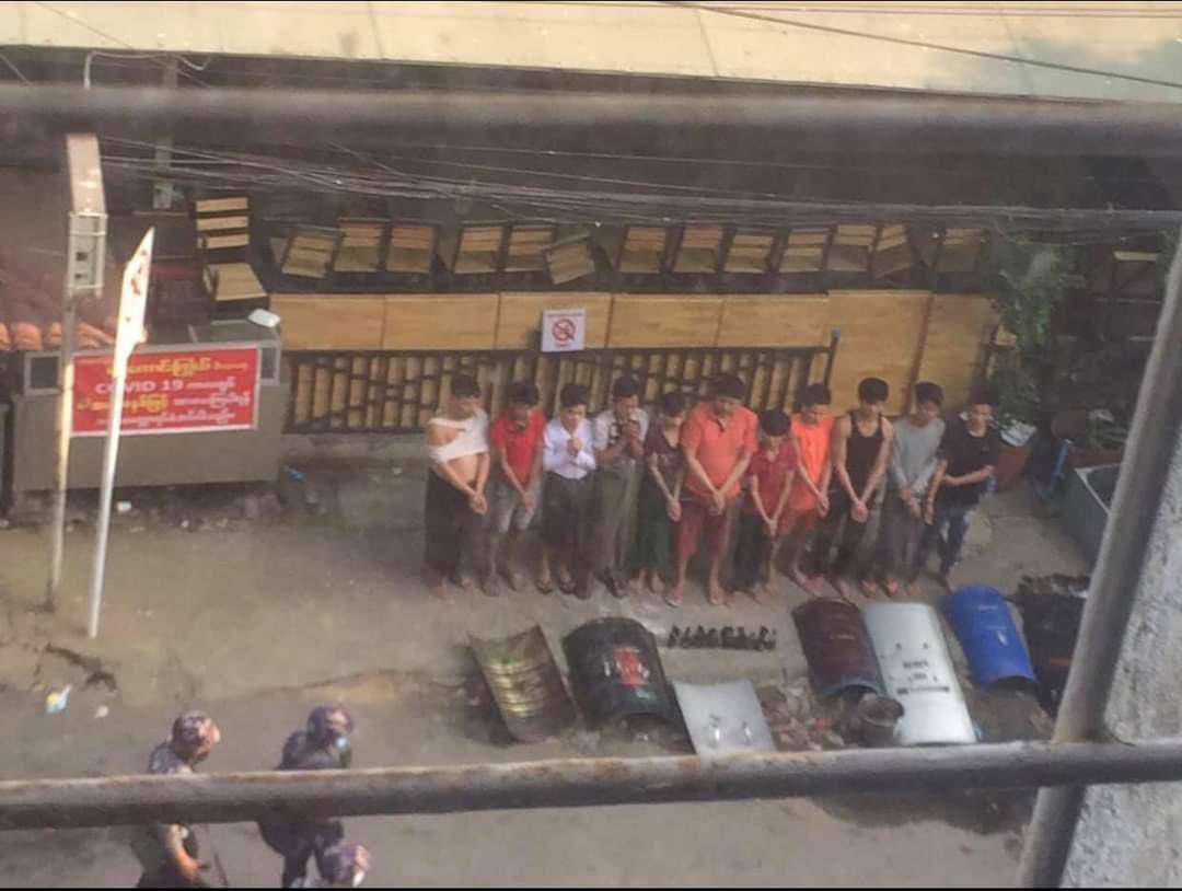 poemamhethar's tweet photo. 📍 Kan Street, Yangon 
Young staffs at a teashop were arbitrarily violently arrested &amp; there being treated &amp; taken records like criminals for no reasonable ground by Junta’s terrorists. 
- Shields seen in photos are not even belong to them
#WhatsHappeningInMyanmar #Mar17Coup https://t.co/OHp2fCh8st