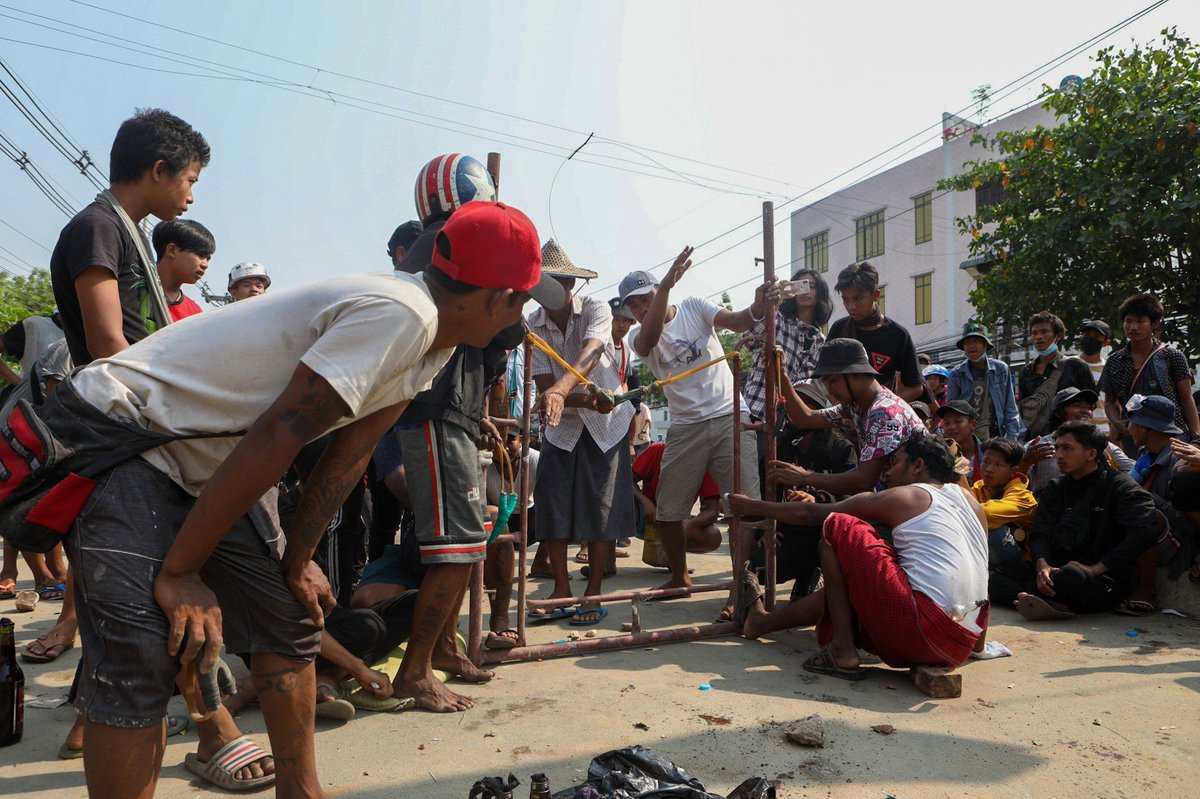 Frontier Myanmar (@frontiermm) on Twitter photo One civilian was shot dead and three injured in Yangon's Insein Township today, but – as our photographer captured – residents are fighting back with catapults and Molotov cocktails. More deaths and injuries reported across the city. Stay tuned. #WhatsHappeningInMyanmar One civilian was shot dead and three injured in Yangon's Insein Township today, but – as our photographer captured – residents are fighting back with catapults and Molotov cocktails. More deaths and injuries reported across the city. Stay tuned. #WhatsHappeningInMyanmar