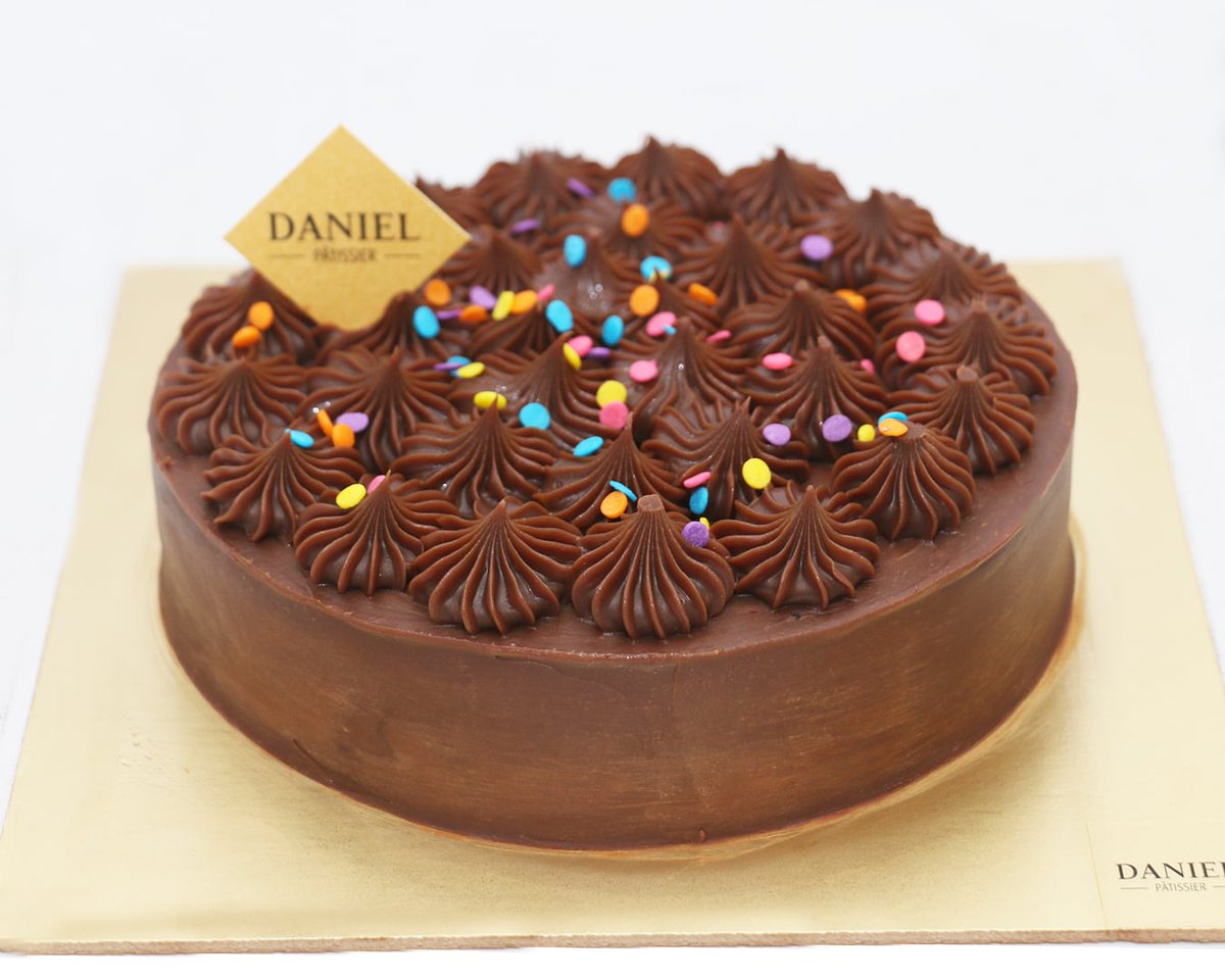 Daniel Patissier We Created The Most Delicious Milk Chocolate Sandwiched Between Moist Chocolate Sponge Trust Us A Single Slice Will Not Be Enough Danielpatissier Birthdaycake Chocolate Chocolatecake Dessert Birthday