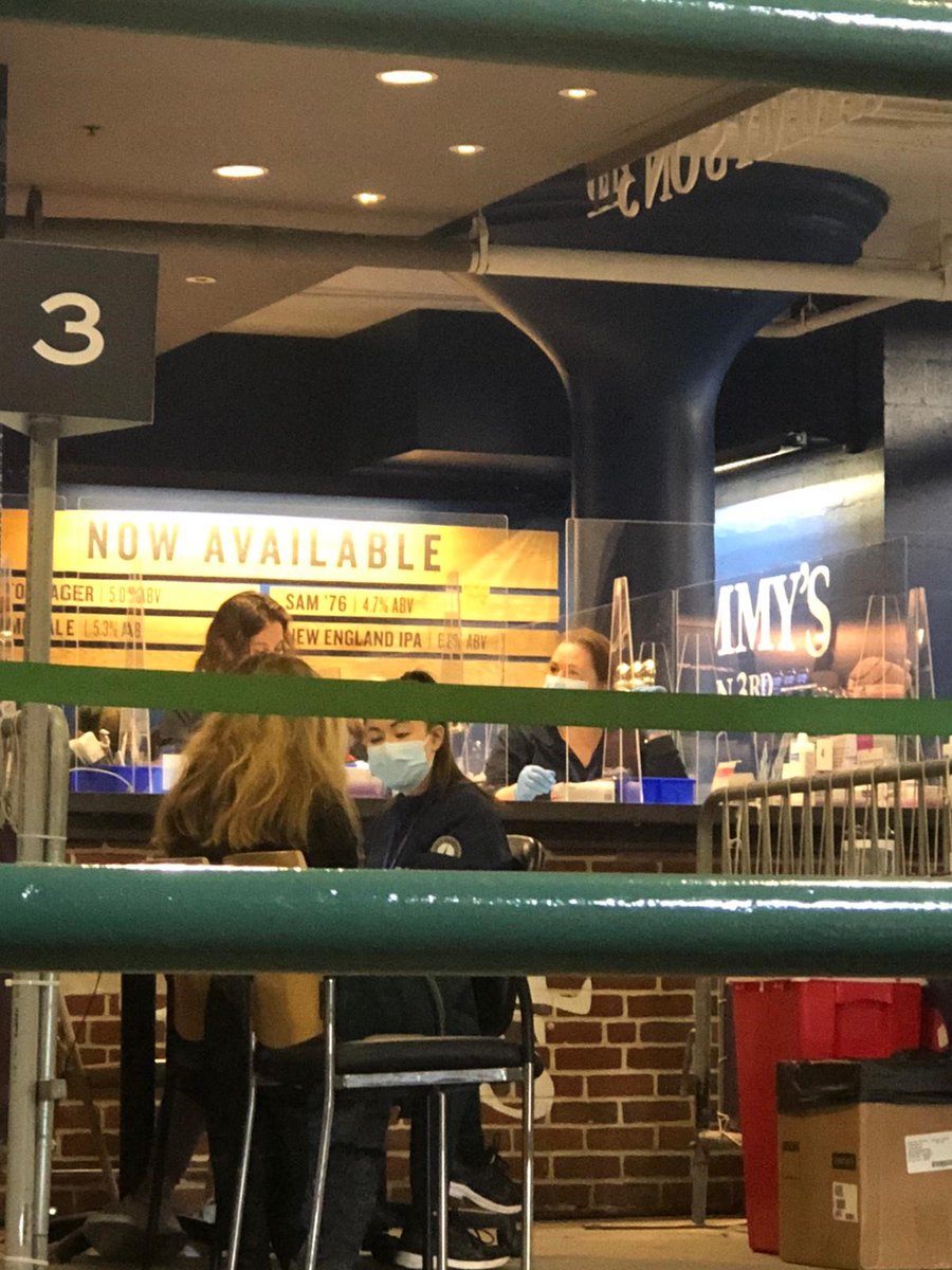 The most Boston thing ever: My friend just got a vaccine at Fenway Park, on St. Patrick's day... and the staff are preparing the shots behind one of the bars. Kinda shocking they don't have the Murphys playing in center field to round it out. @OnlyInBOS