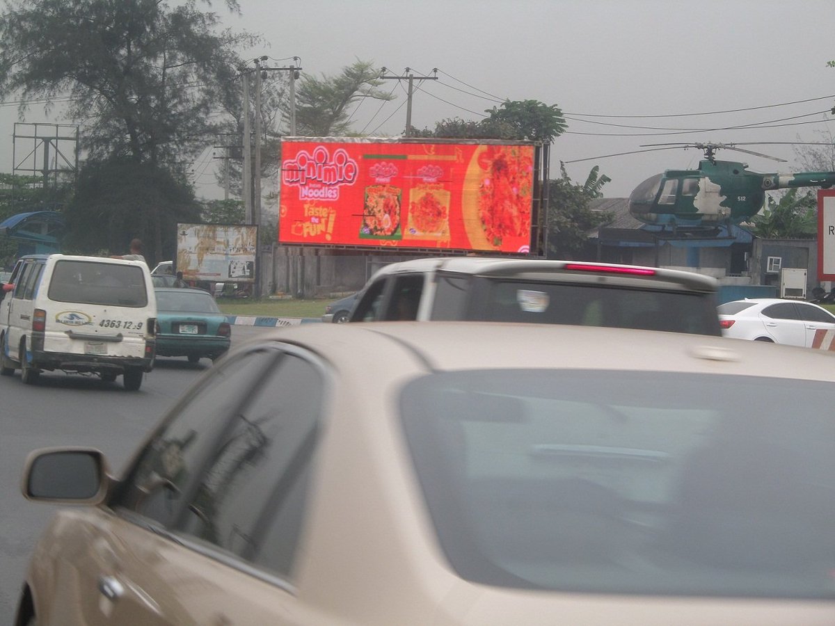 Minimize Noodles on the DOOH along Aba Road opposite Happy Bite Plaza by Air Force junction, Port-Harcourt