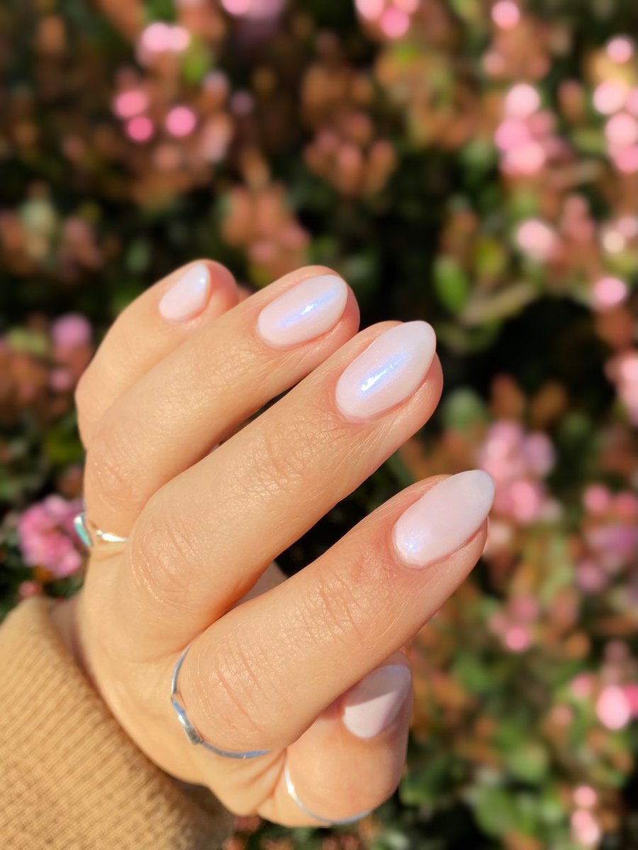 Who’s ready for spring? 🙋🏽‍♀️
“Sybil” by @loudlacquer is definitely giving me spring vibes! It’s a gorgeous pale pink with a subtle blue shimmer! 🌸✨💖