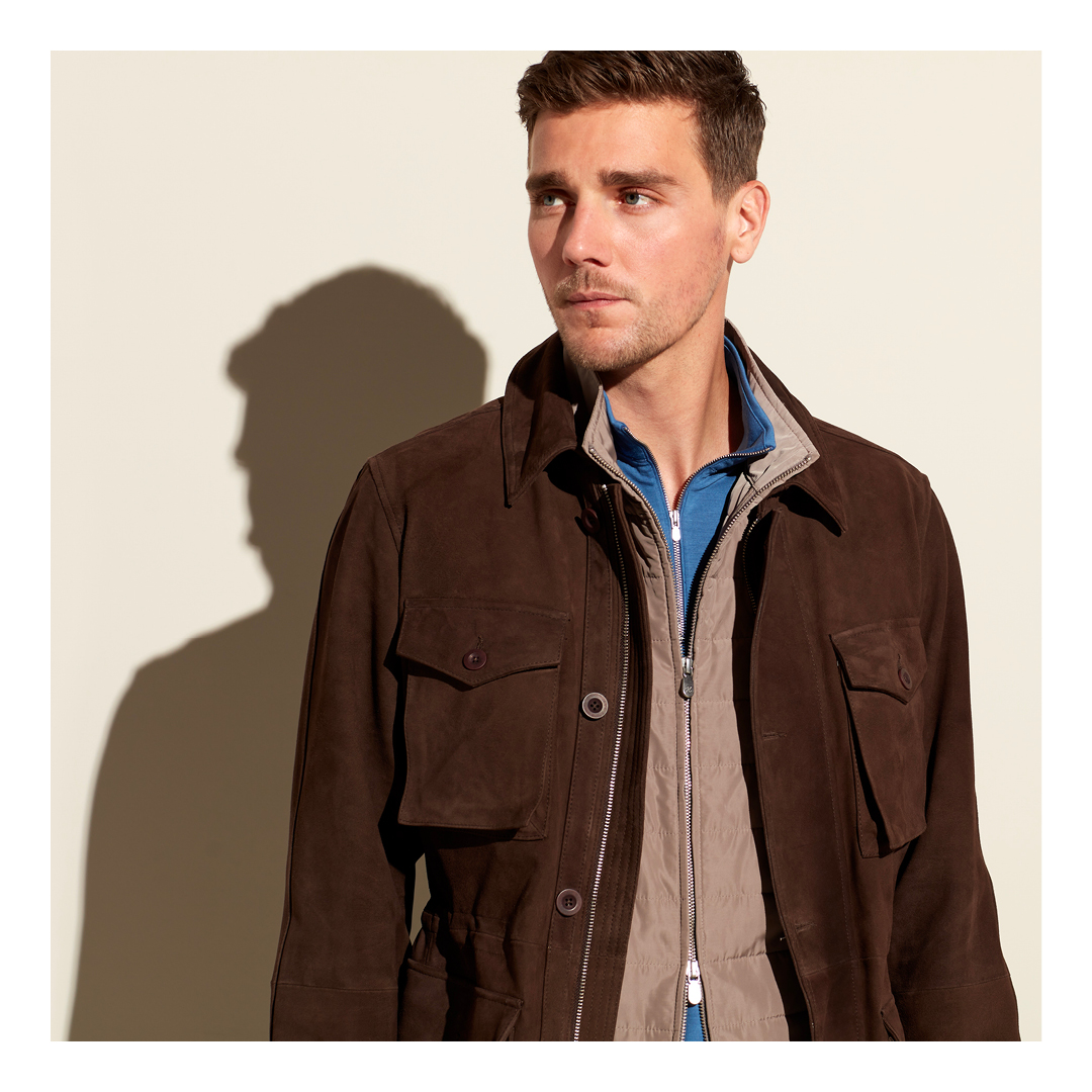 The classic field jacket custom-made in luxurious suede. This versatile style with military roots is made from buttery brown natural suede and lined with insulating tech to trap heat.