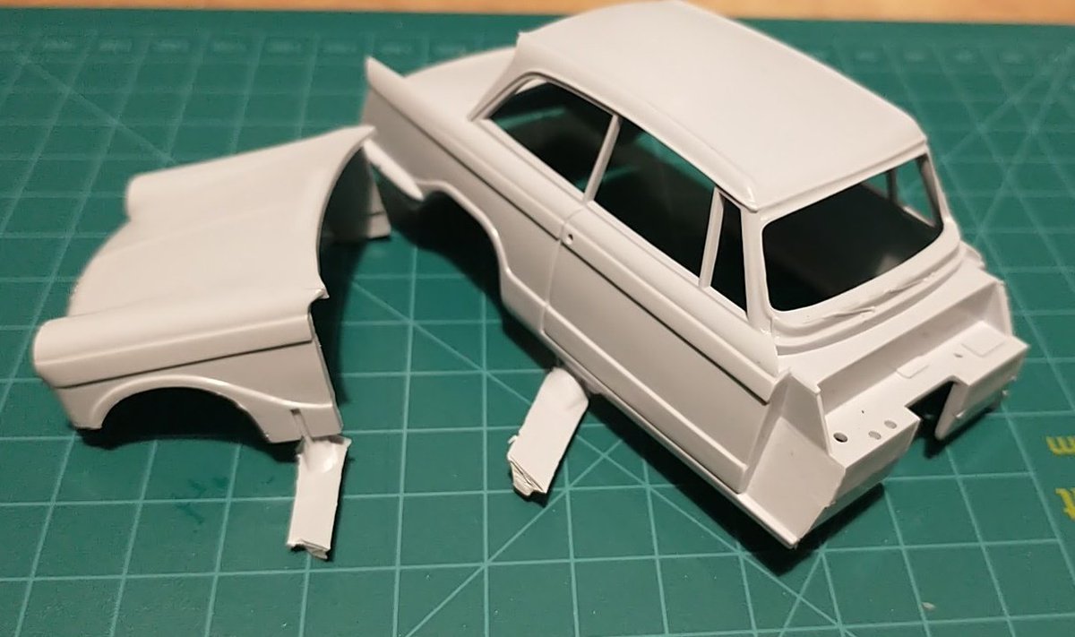 In the huge pile of "cheap models I'm not very invested in so I'm not too worried if I mess them up" is an Airfix Triumph Herald, apparently from the same era as the Beetle i.e. mid-'70s, but my goodness, the mould's in much worse shape. Lookit! Sprue stubs! Flash (aah-aah etc)!