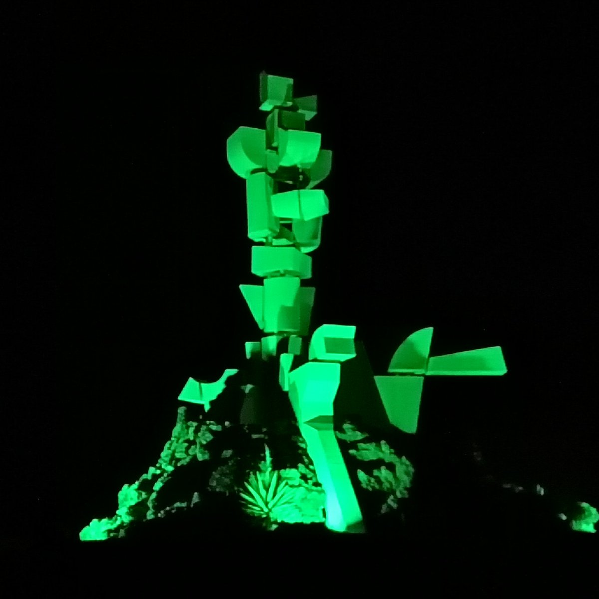 lanzarote247's tweet photo. Monumento del Campesino all lit up for #StPatricksDay #Lanzarote https://t.co/IoziuMSJ3D