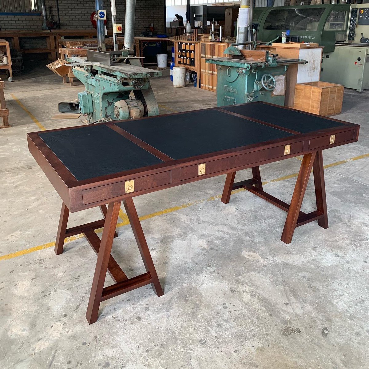 Mahogany campaign desk with flush fitting brass handles and leather inlay top. 🎖