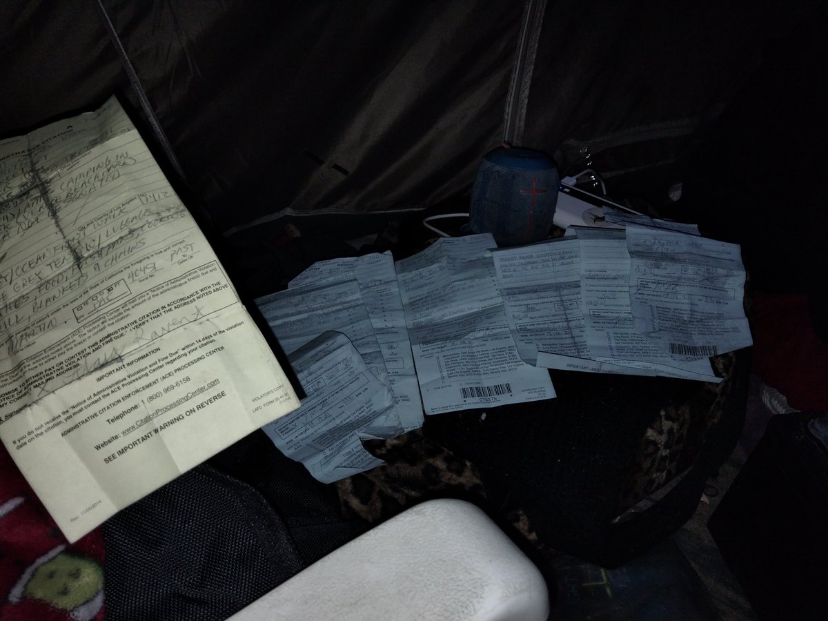 Tickets for camping. About 7 of them in the background.