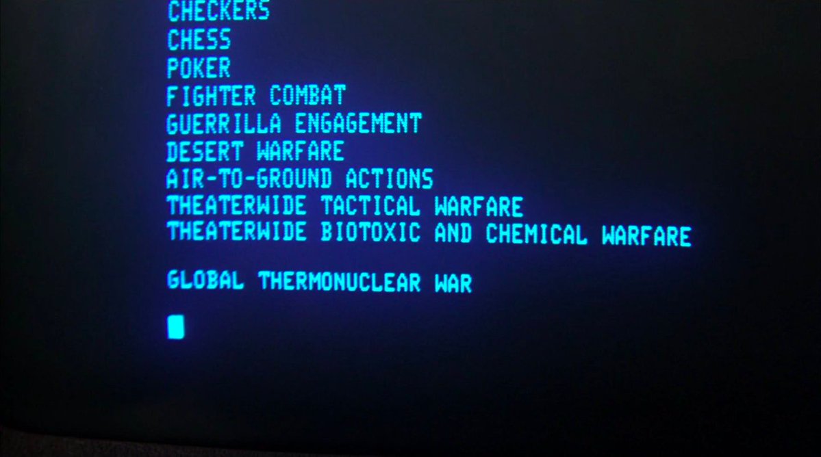 An old computer screen displaying a list of games like chess, poker, and war ones, including one called "global thermonuclear war".