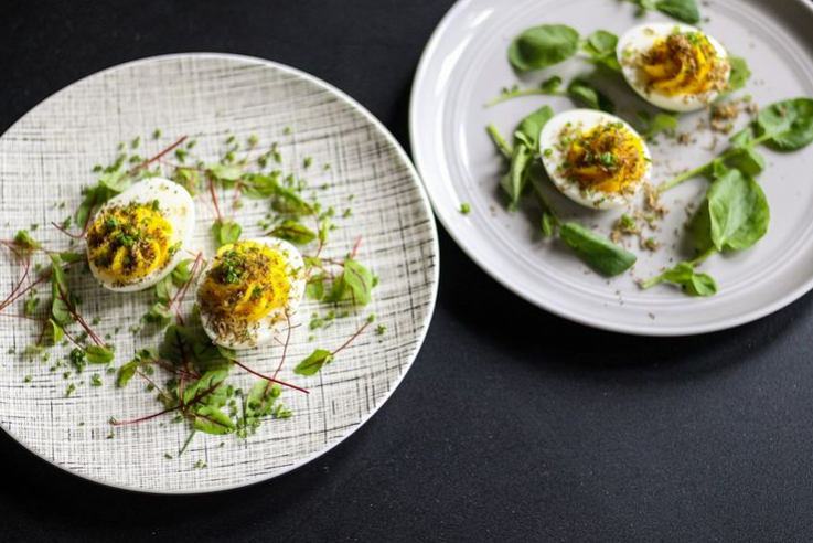 Our mouth's are watering for @ChefToben's truffled Deviled Eggs with chives &amp; fresh shaved black truffle!