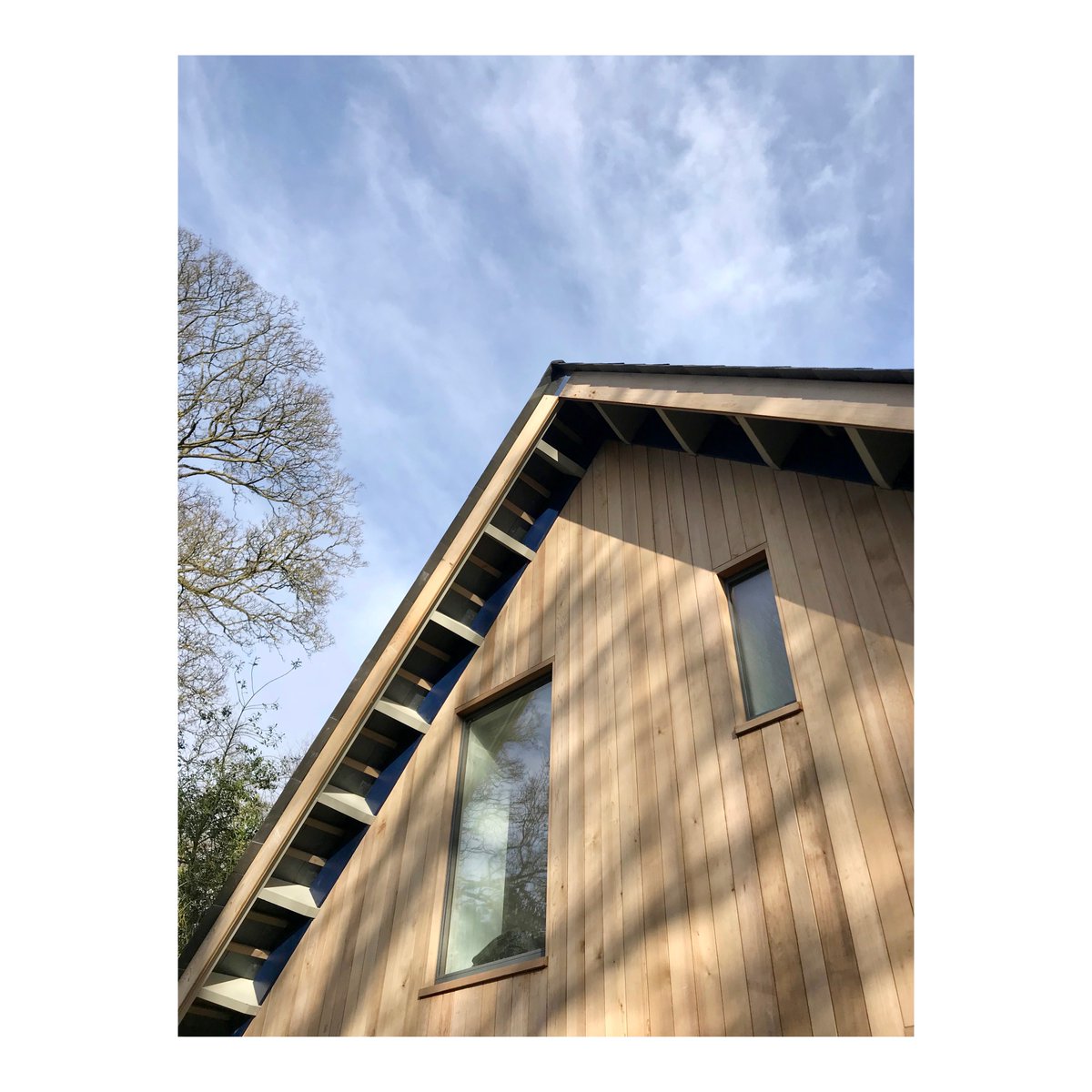 Spring light and sharp shadows compliment the intricate set out of exposed slate roof structure. #knoxbhavan #construction #newhouse #hertford #workinprogress #grove #springlight #roofstructure