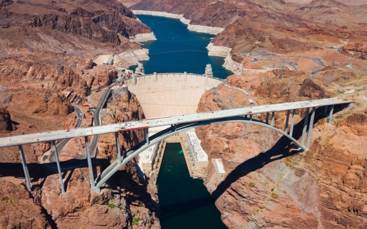 the Hoover Dam netted Bechtel $2 million in profits (roughly $600 billion in 2013 dollars), but its construction was just soaked in the blood of exploited construction workers