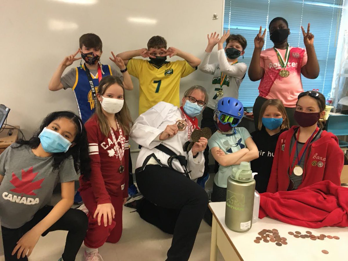 irenepow1's tweet photo. We had so many Olympians in class today, we couldn’t all fit on the podium! @StTheresaOCSB https://t.co/OUtAl1YYwu