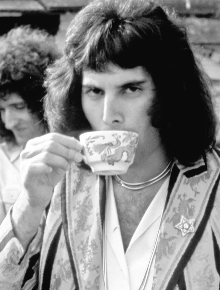 Freddie Mercury with a cup of tea made of porcelain shows the delicate, elegant, classy and sophisticated man he was. He looks more expensive than a diamond: if luxury was a human, it would be him.