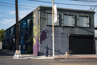 artsdistrict_la's tweet photo. The new office signage on the ADLA BID office is coming along nicely! Much love to @zoueh_skotnes, @doner_one and @oh_yanoe for have grinding away this past week. Thank you for this incredible addition to the neighborhood #streetart #artsdistrictla #mural https://t.co/1XZ9dWY1nA