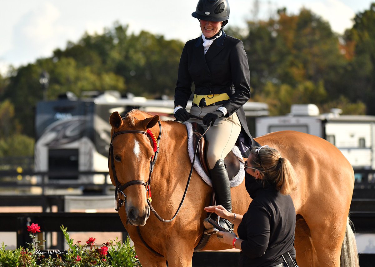 WIHS's tweet photo. We can’t look at this photo without smiling ☺️😍
What a great moment captured by @ShawnMcMillen 

#WIHS #WIHS2020 #Smiling #equestrian https://t.co/SWNsXjywvB