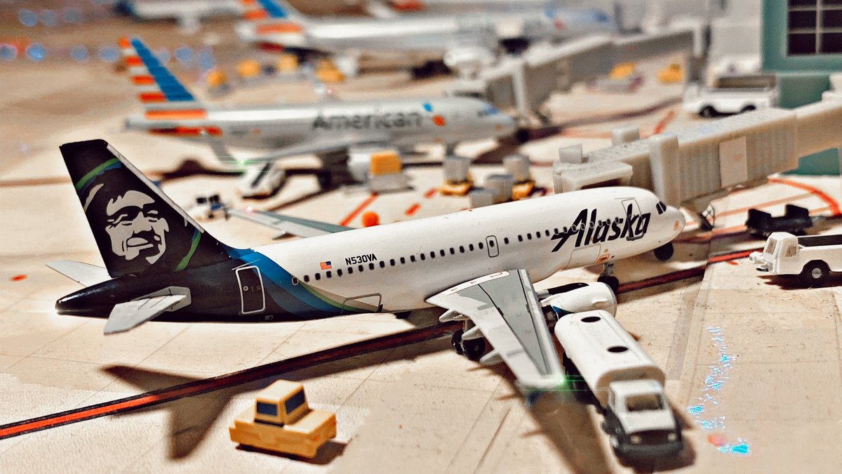 AmericanAir's tweet photo. Hey @AlaskaAir! We asked Instagram's tiny airport model extraordinaire Runway__37 to help us welcome you into the @traveloneworld Alliance by setting up these diecast planes. Just a small-scale way, 1:400 to be exact, to show our large-scale excitement ☺️. https://t.co/4DwjazrCu2